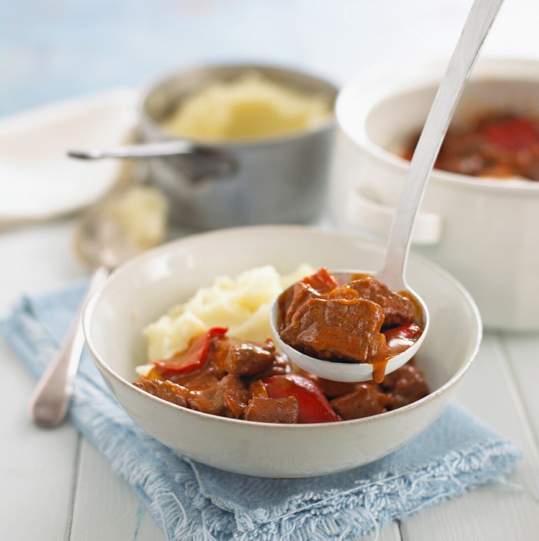 Beef goulash with peppers and mashed potato