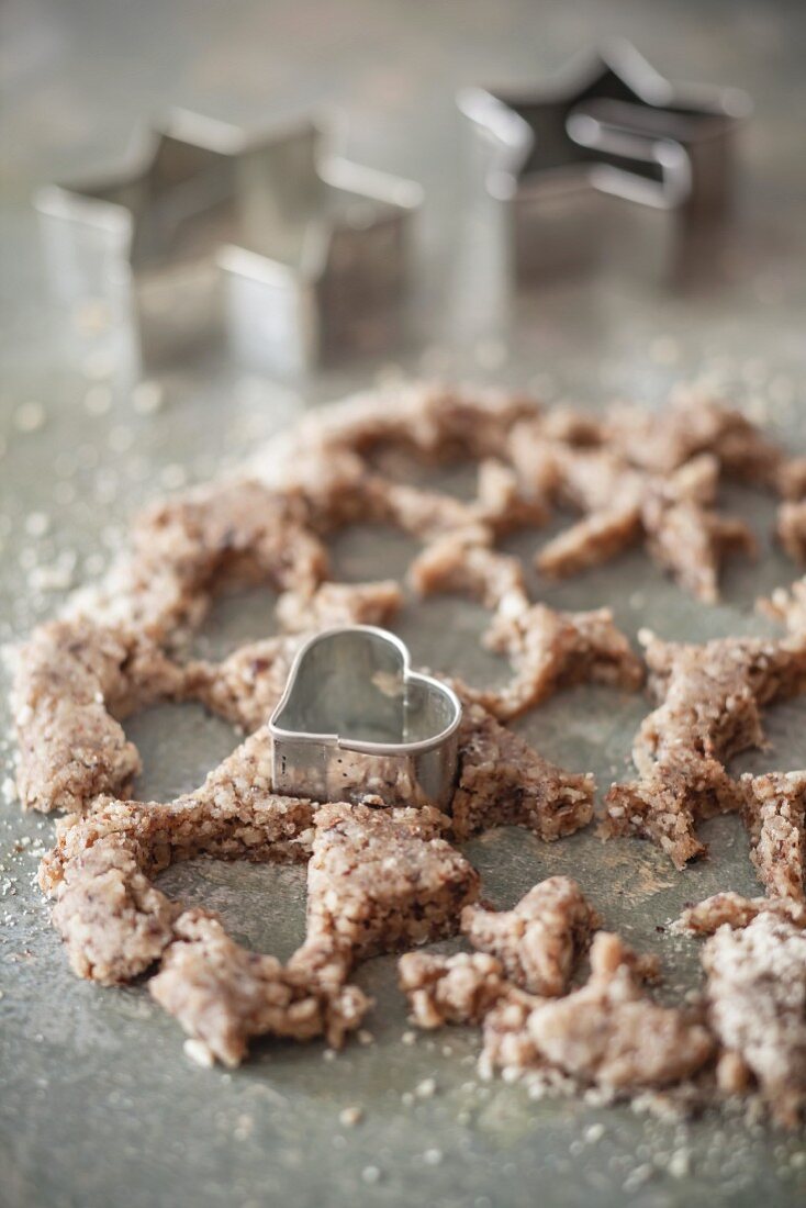 Leftover biscuit dough after cutting out biscuits, with a heart-shaped cutter