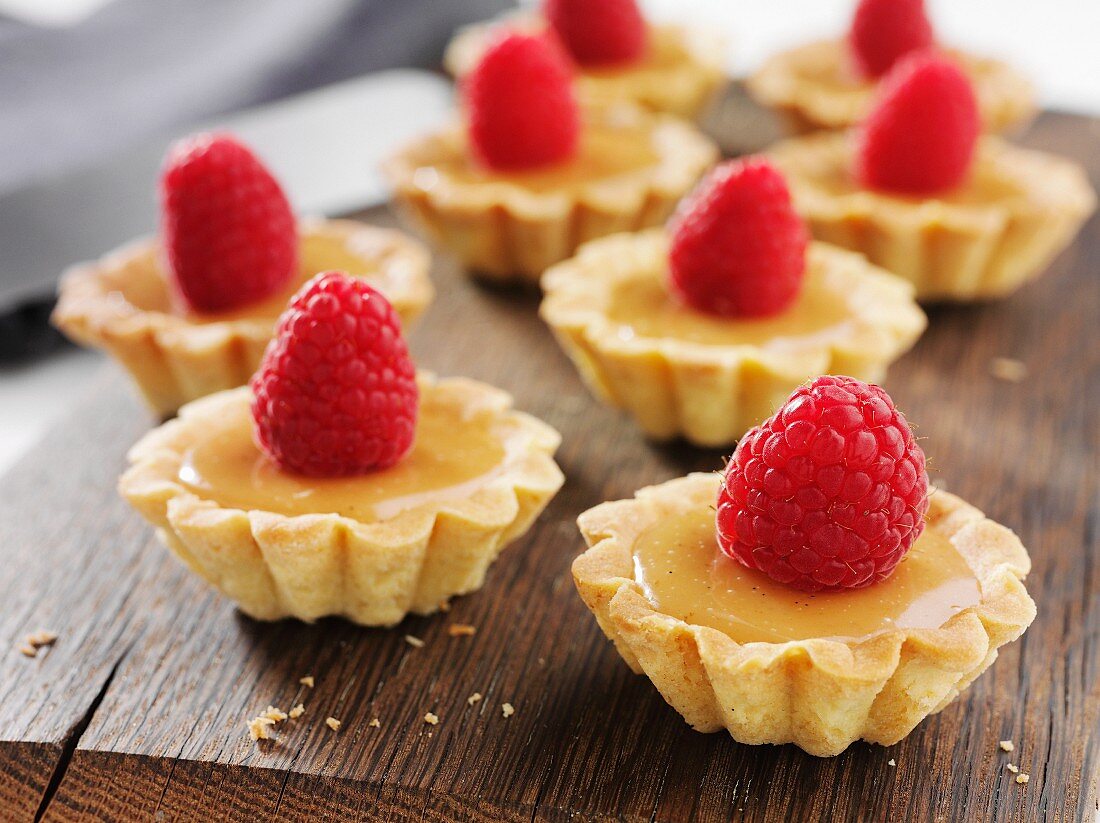 Custard tartlets with raspberries