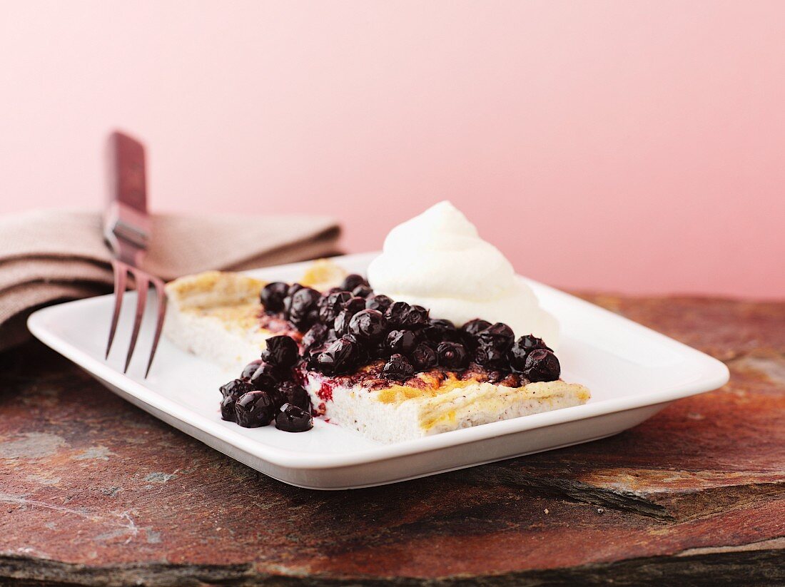 Pancake with blueberries and cream