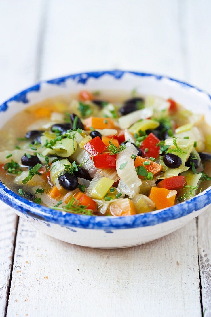 Vegetable soup with olives and thyme