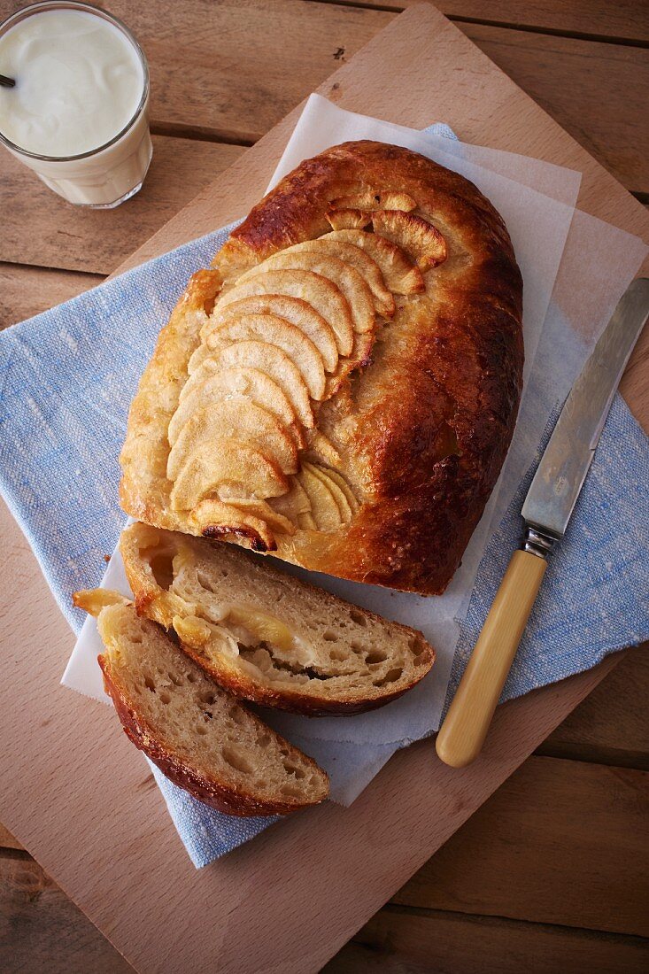 Brioche loaf with potatoes, partly sliced
