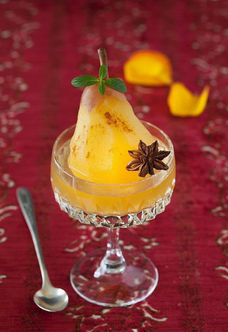 Poached pear with anise star in cristal glass