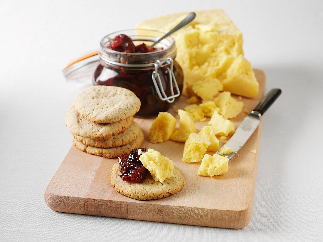 Swedish Västerbotten cheese with walnuts and red gooseberry jam
