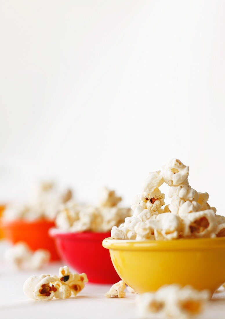 Popped Corn in Colorful Bowls