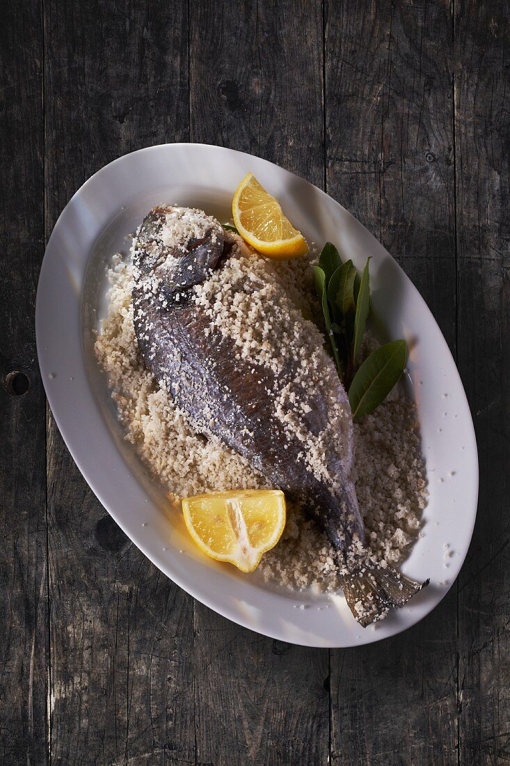 Gilt-head bream in a salt crust with lemon