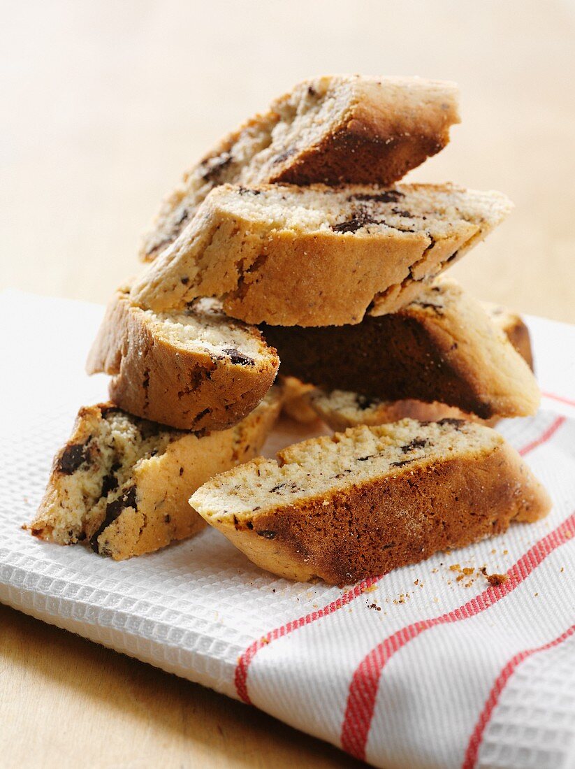 Stacked biscotti on a tea towel