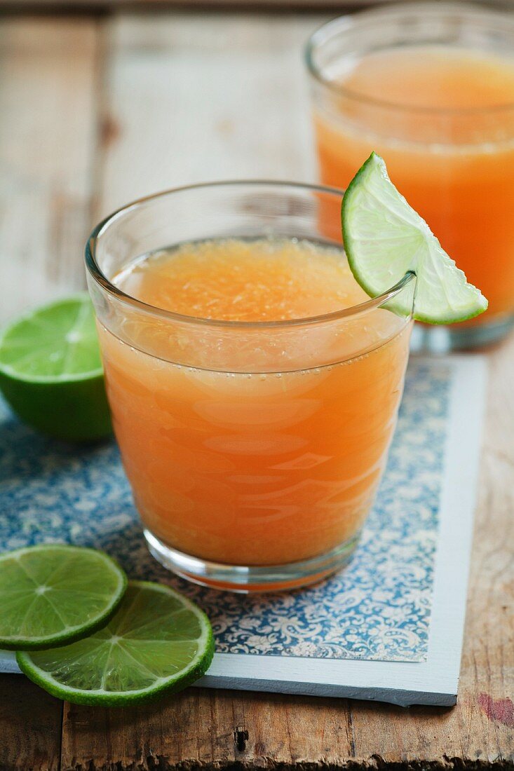 Satsuma and grapefruit drink with lime