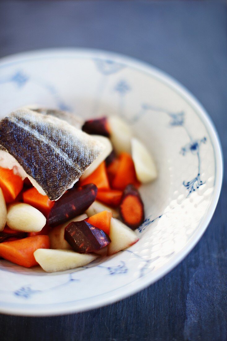 Cod fillet with root vegetables and carrots