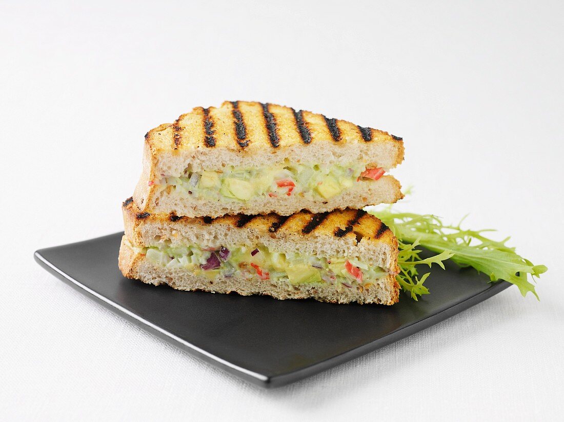 Toasted sandwich with surimi and avocado