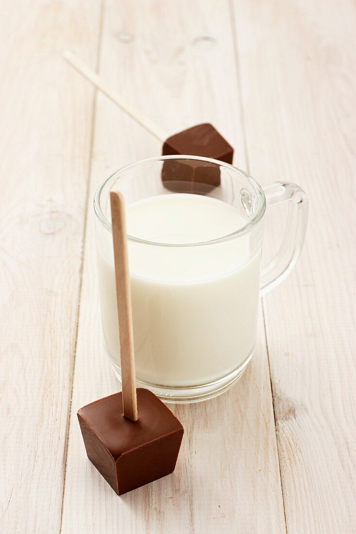 Hot milk and a cube of chocolate to dip in it