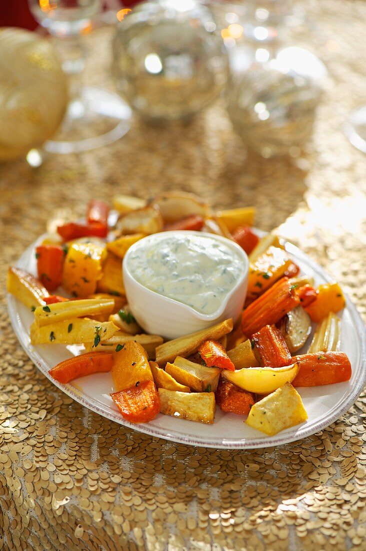 Oven-roasted root vegetables with a herb dip