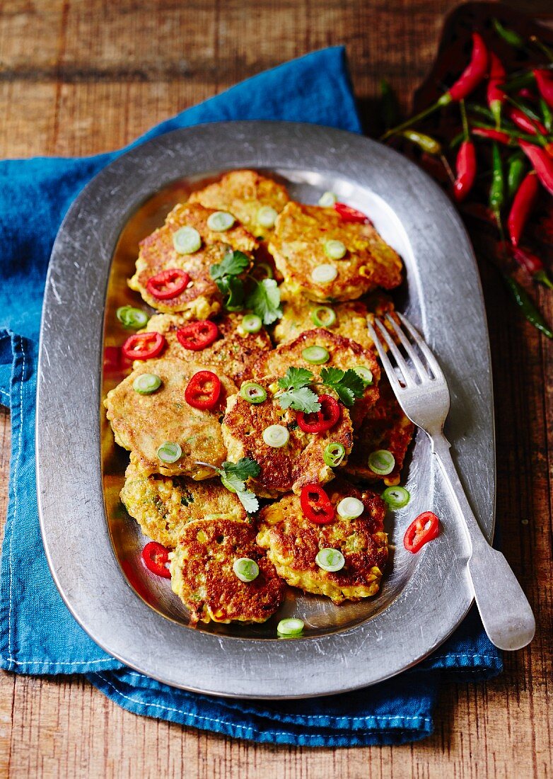 Sweetcorn fritters with chilli rings, spring onions and coriander