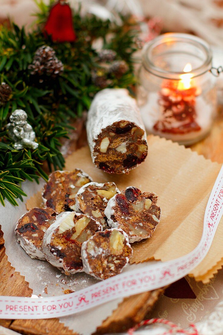 Chocolate 'salami' with cranberries, marzipan and walnuts, for Christmas