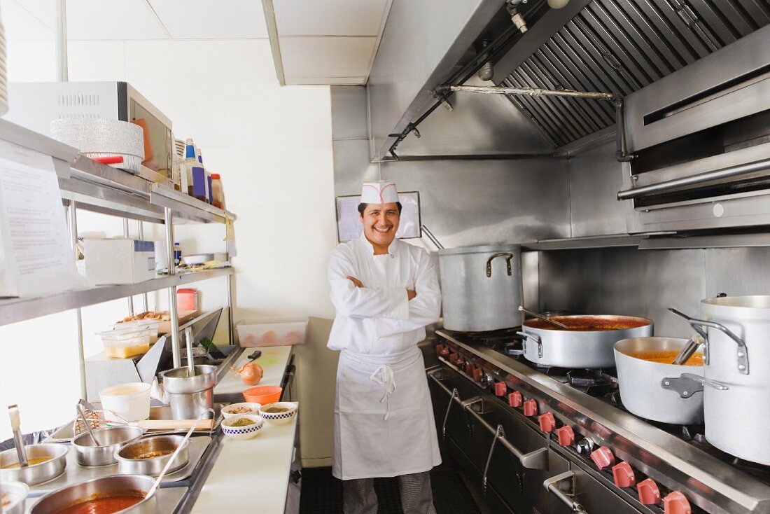 Hispanic cook in commercial kitchen