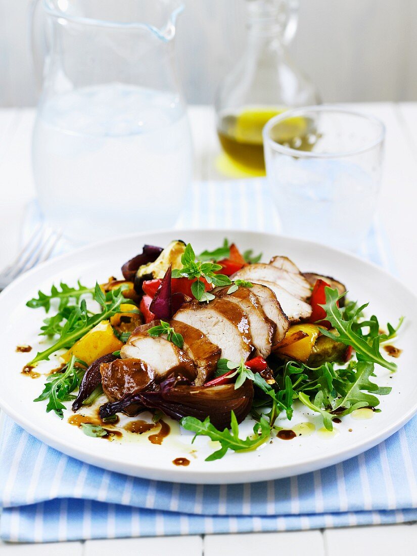 Chicken with roasted vegetables and rocket