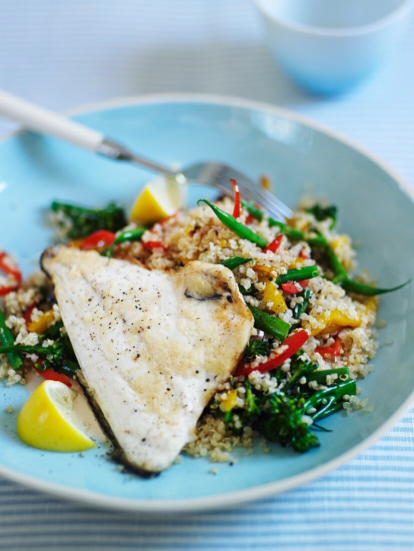 Quinoa with vegetables and grilled fish