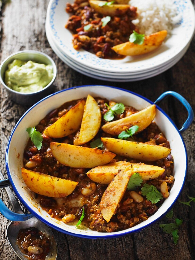 Chilli con carne with potato wedges