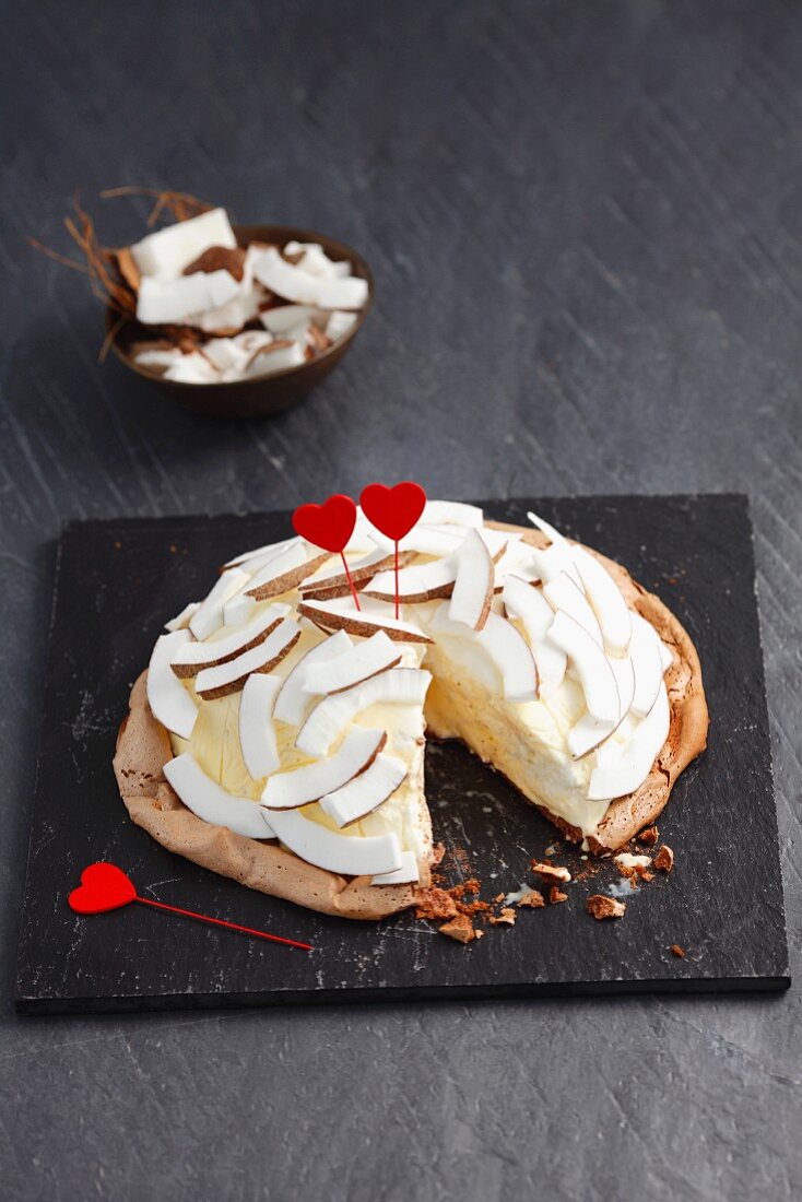 Coconut ice cream torte with heart decoration