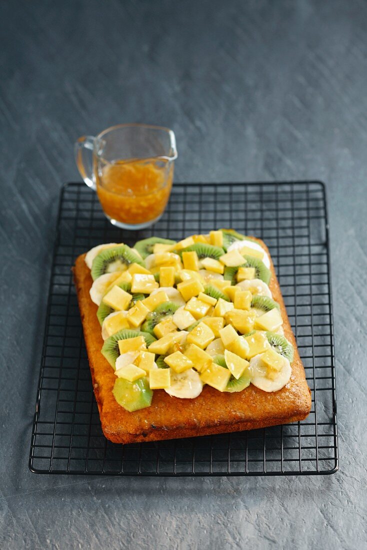 Coconut sponge cake with tropical fruits