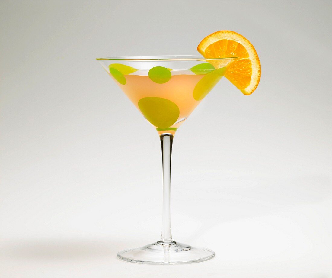 Bellini Cocktail mit Orangenscheibe