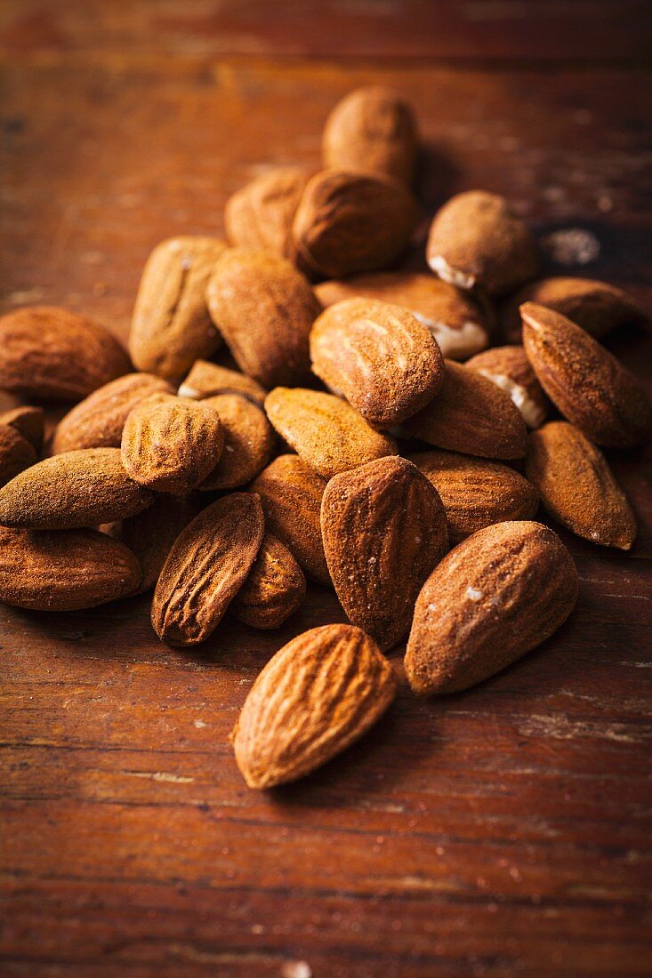 Almonds on a wooden surface