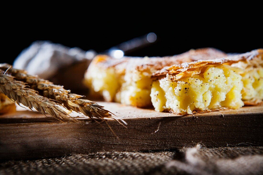 Bougatsa (breakfast pastry made from filo pastry and semolina pudding with cinnamon, Greece)