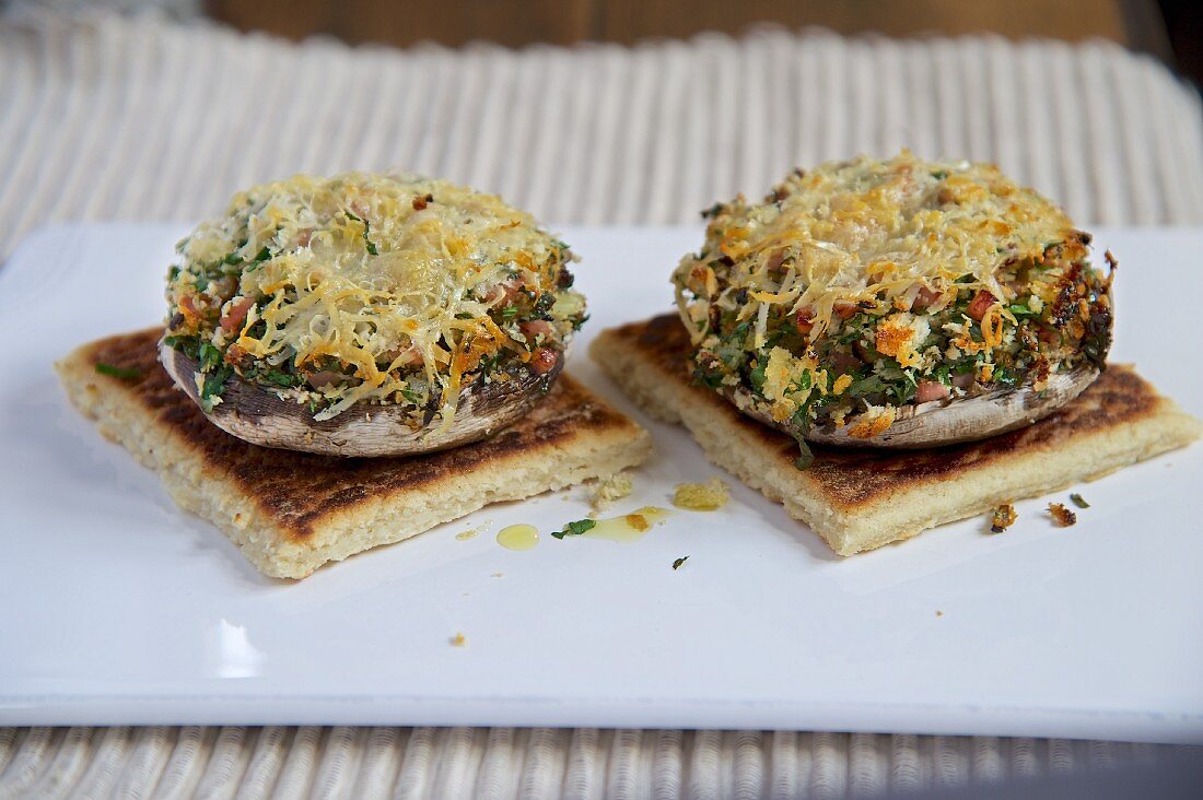 Stuffed portobello mushrooms, topped with cheese and baked