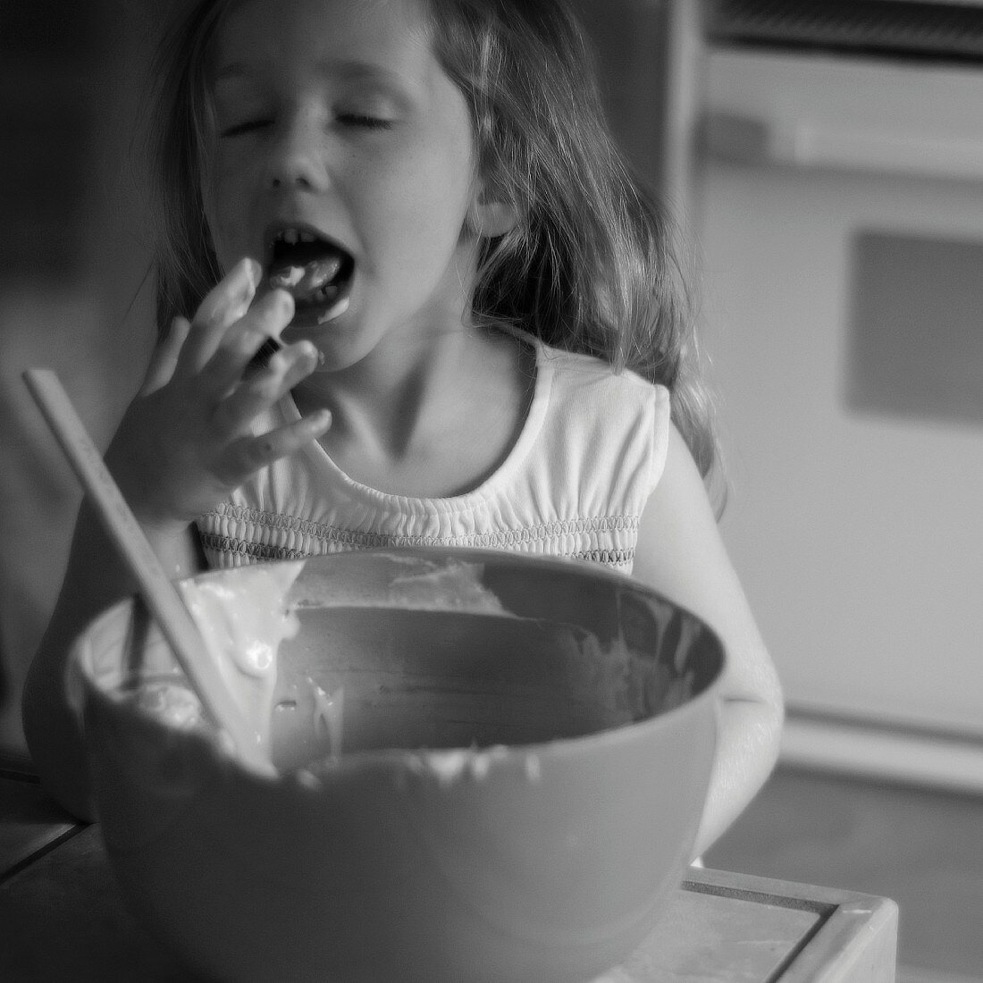 Girl Tasting Batter