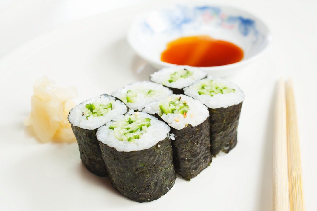 Maki sushi with cucumber, ginger and soy sauce