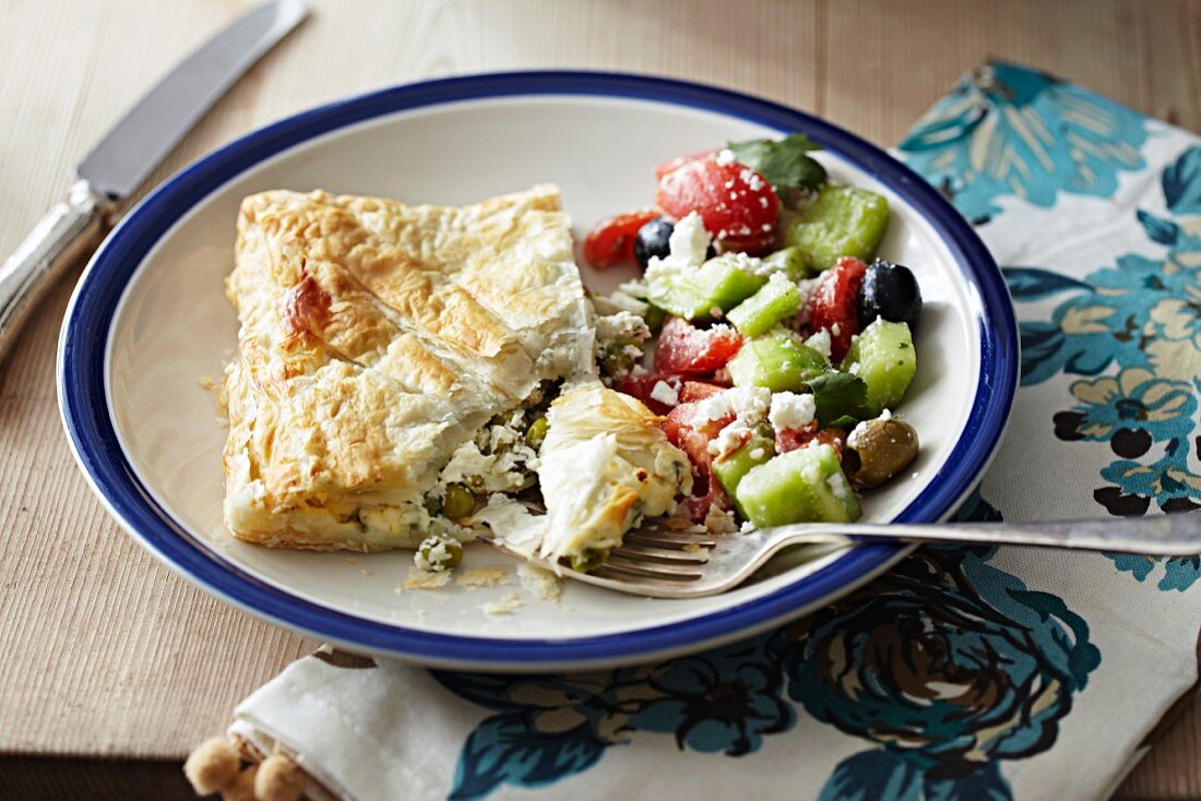 Cream cheese and pea strudel with Greek salad