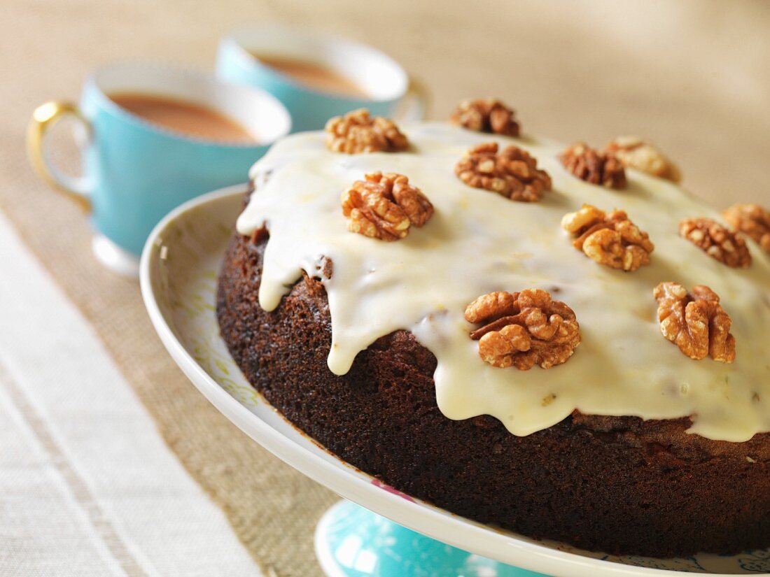 Gluten-free carrot cake with walnuts and sugar glaze