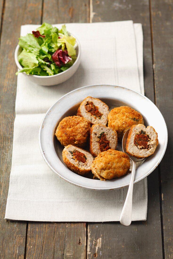 Schweinehackbällchen mit getrockneten Tomaten