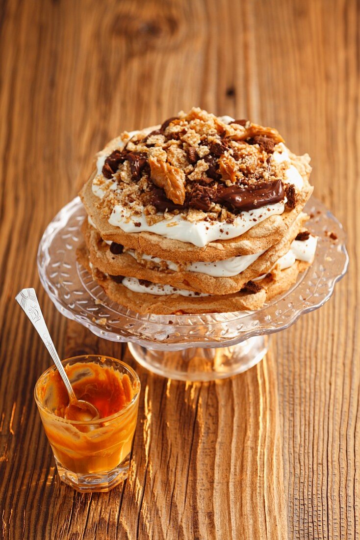 Chocolate meringue layer cake with sesame brittle and caramel