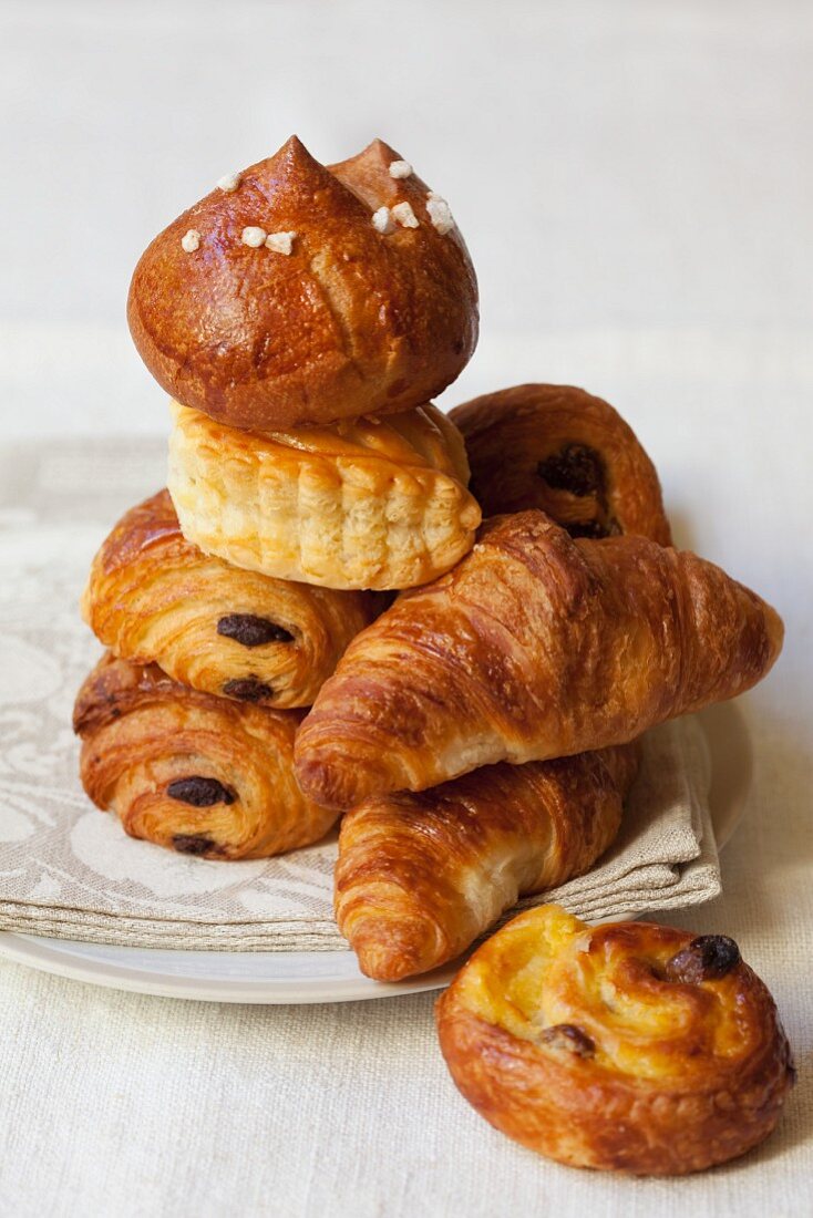 Croissants, puff pastry pinwheels, brioche and and apple turnover