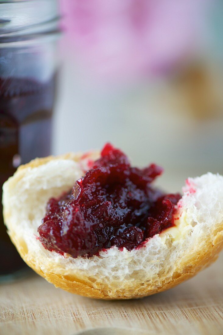 A chunk of white bread with beetroot chutney