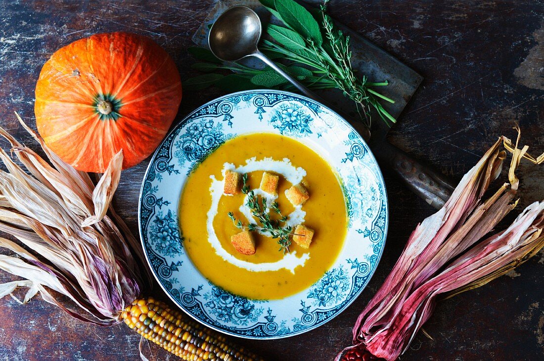 pumpkin soup for Halloween with indian corn