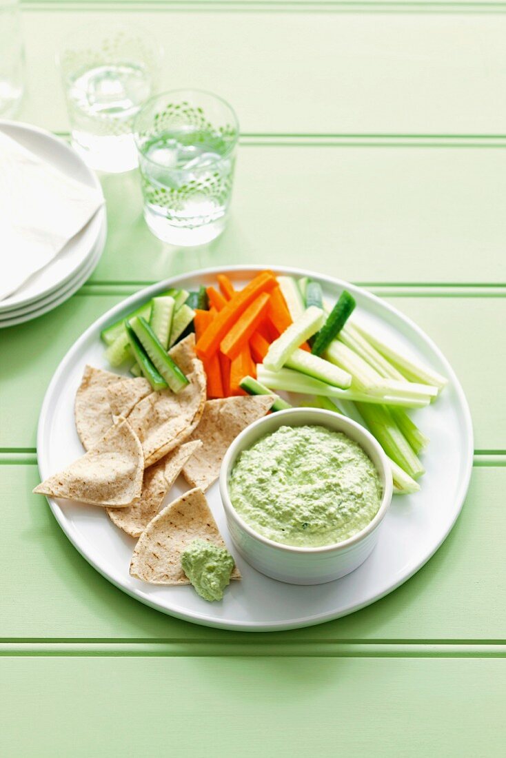 Vegetable batons with warm pea and feta dip and wholemeal flatbread