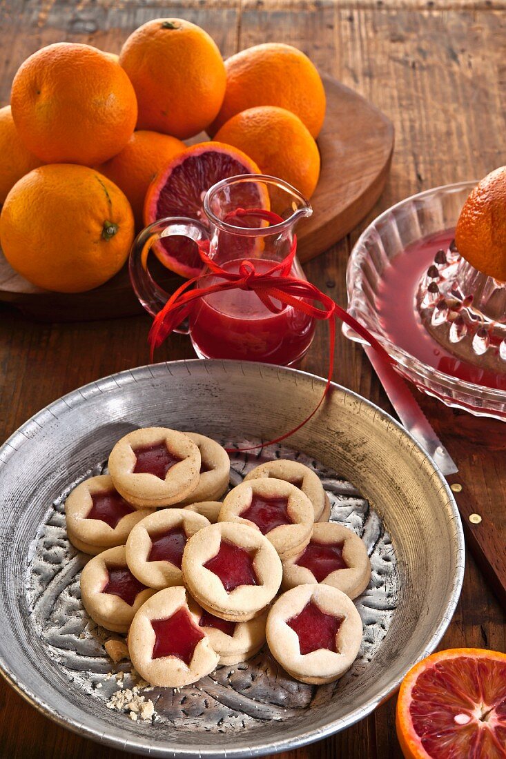 Jam biscuits with blood orange jelly