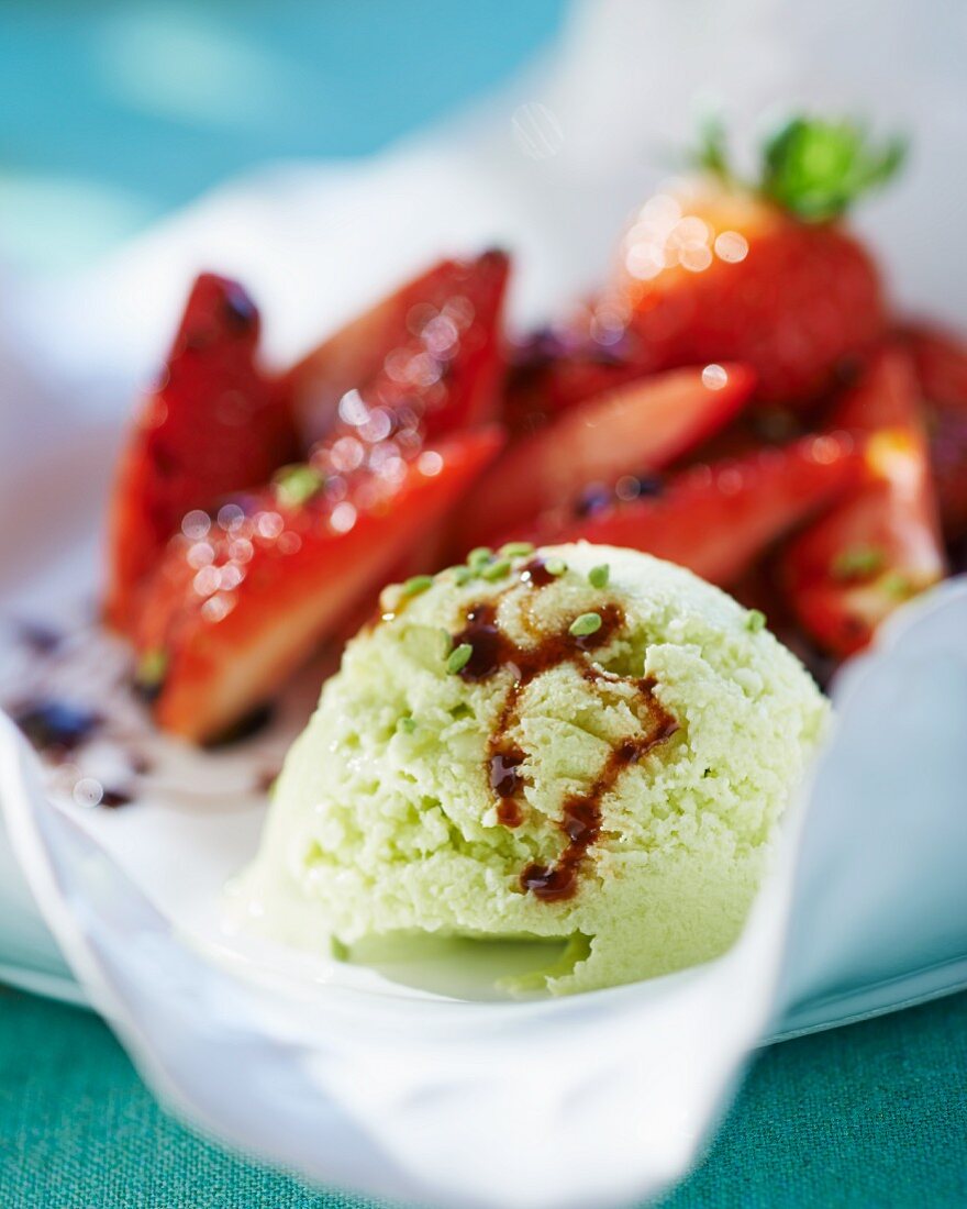 Wasabi ice cream with balsamic vinegar and strawberries