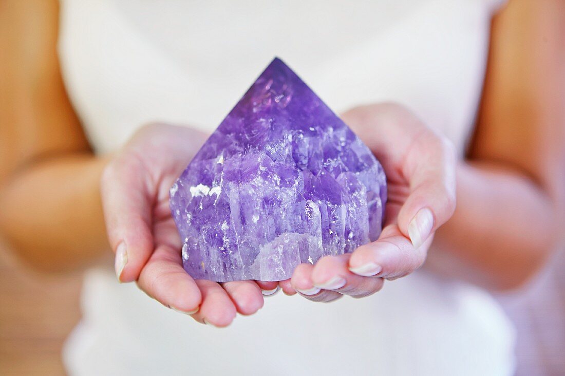 Woman holding amethyst