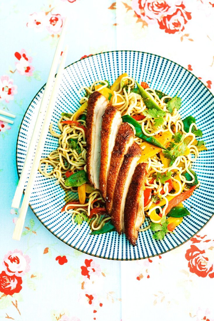 Fried duck breast with oriental fried noodles