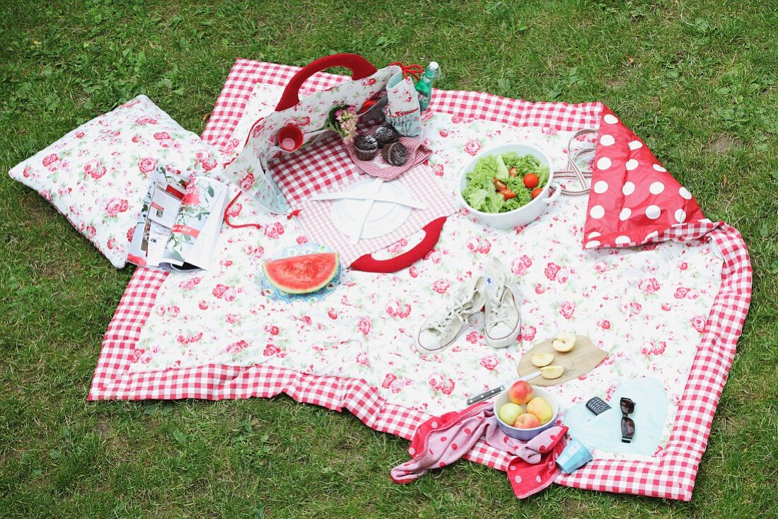 Hand-sewn picnic blanket and bag on lawn