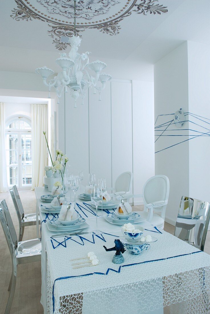 Table festively set in white and blue