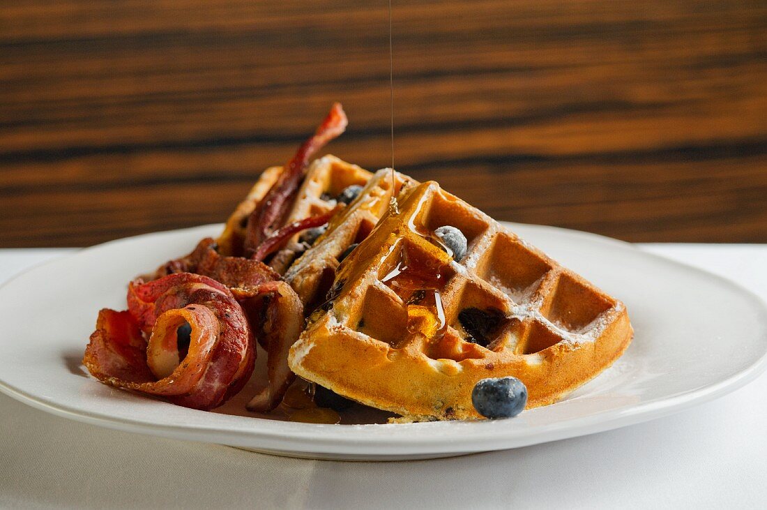 Belgian waffles with blueberries and bacon