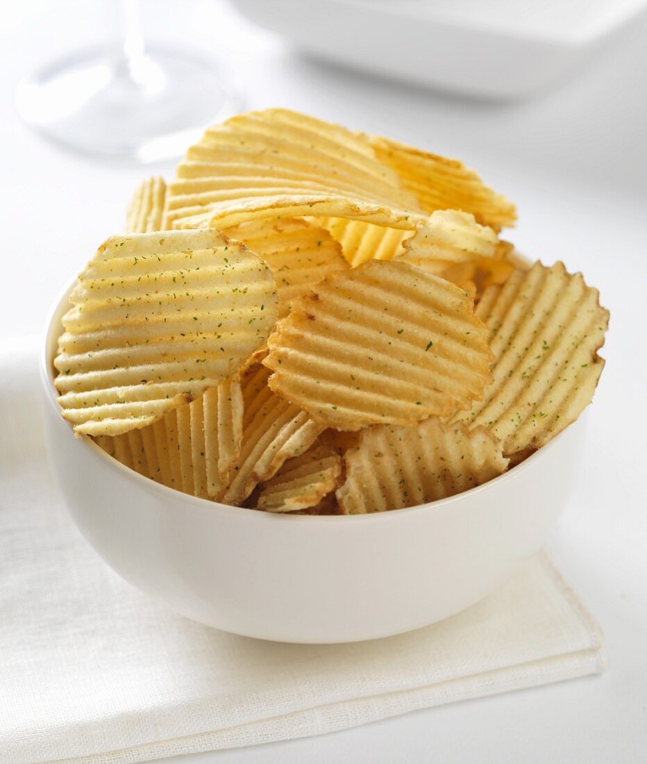 cheese and onion crinkle potato crisps in a bowl