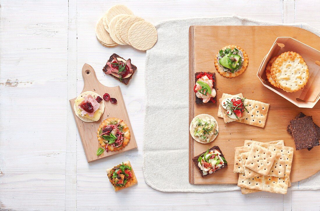 Various canapes made with crackers, crispbread and pumpernickel