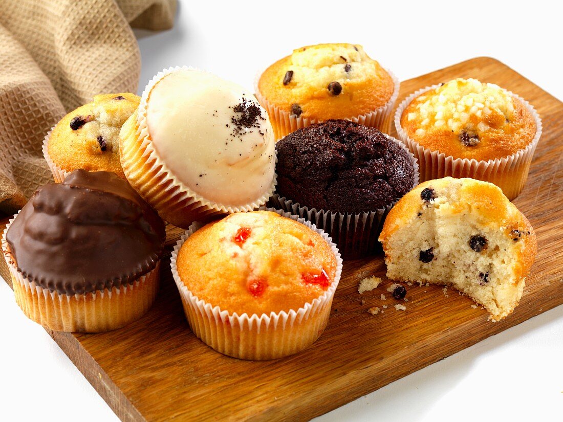 various muffins on a board
