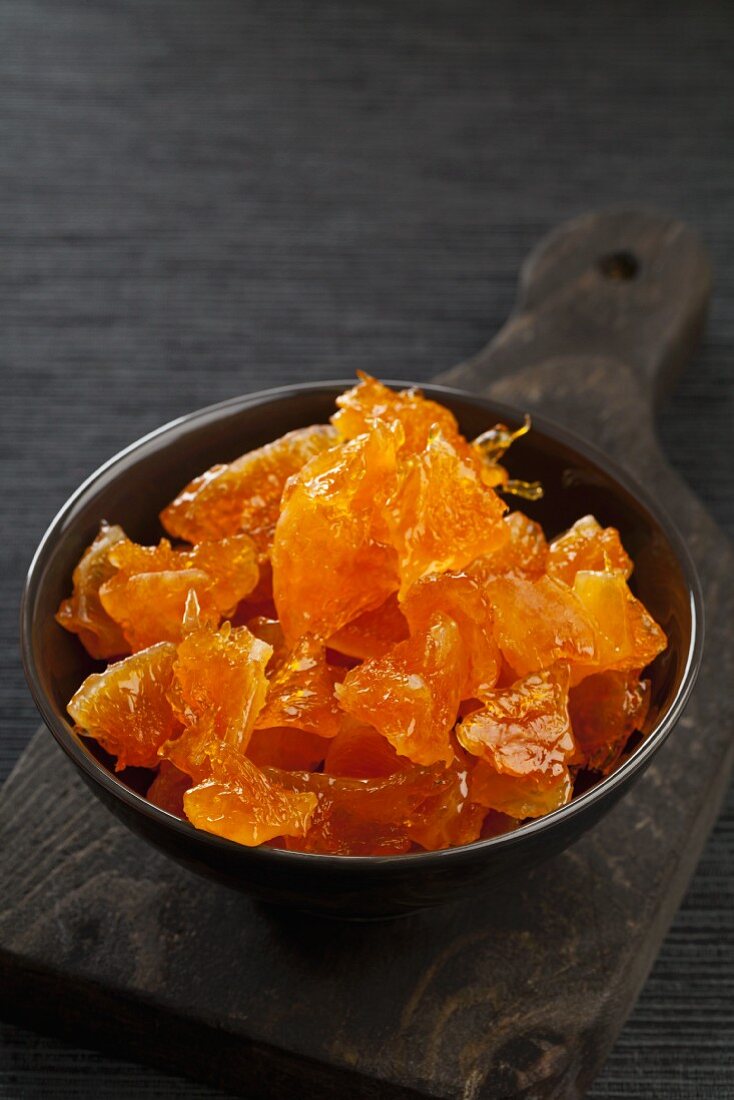 A bowl of candied orange pieces