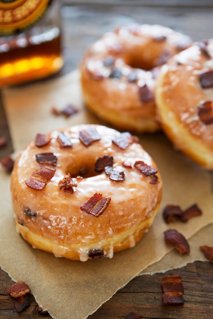 Glazed doughnuts with crispy bacon